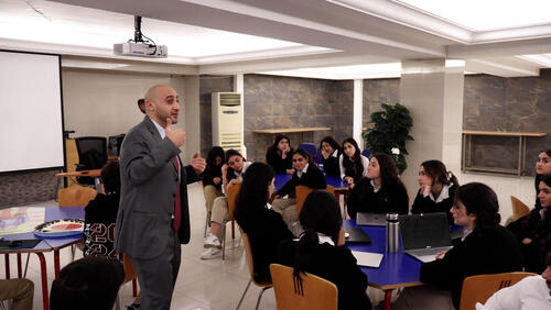  MAS Alum Ali Anani Engages Students in an Analytical Session on Whitman's Poetry